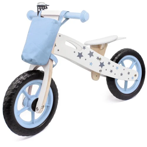 Houten loopfiets met blauwe accenten en sterrenprint.